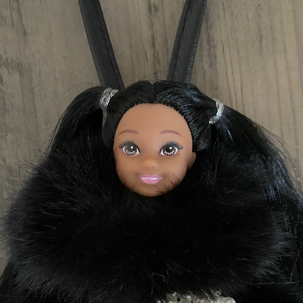 Doll bag charm , key chain wearing  fluffy faux fur coat with purse